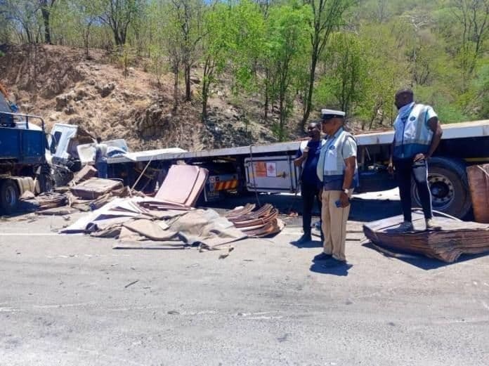 Scene of 911 recovering a truck spill with copper scattered on the road