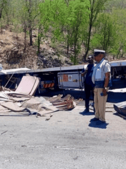 Overturned truck with spilled copper on DRC road